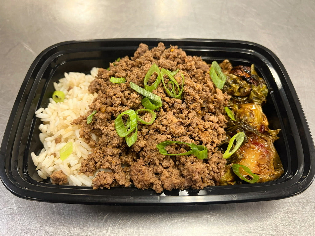 Korean ground beef over steamed rice with bang bang brussels (Gluten-free)