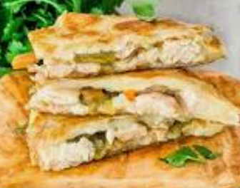 Grilled chicken & green chile quesadilla with sour cream & salsa