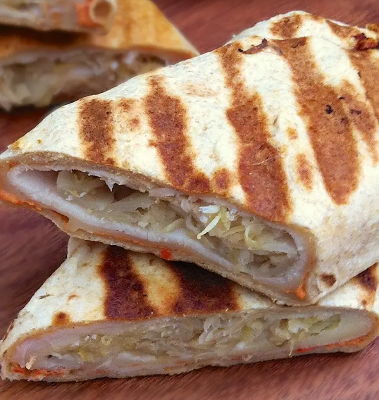 Turkey reuben toasted wrap with Thousand Island dipping sauce