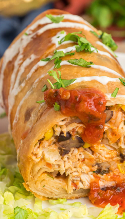 Shredded chicken & black bean “chimichanga” with side of avocado crema & house-made enchilada sauce (NEW)
