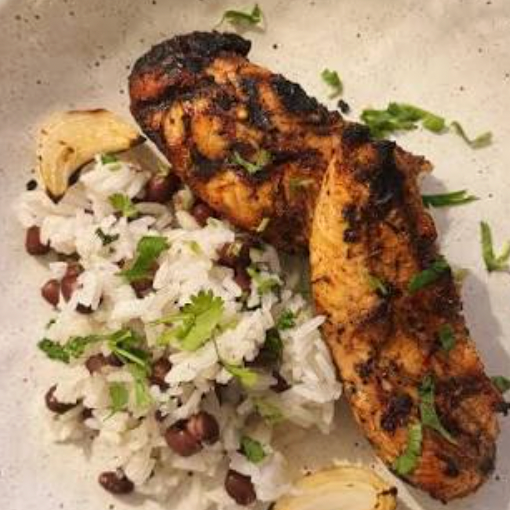 Jerk chicken tenders over Caribbean rice with creamy pineapple mango salsa (Gluten-free)