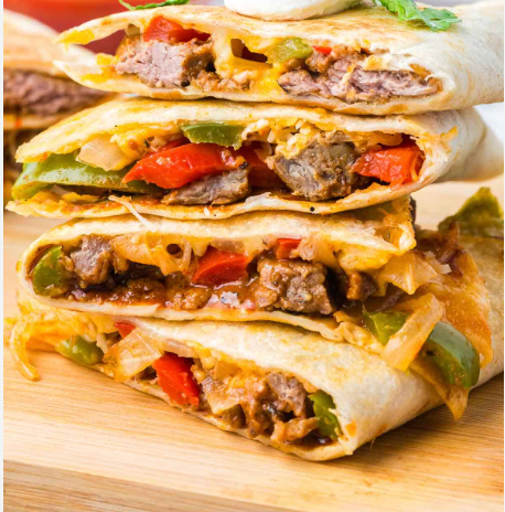 Fajita steak quesadilla with avocado crema