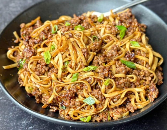 Mongolian beef stir fry over rice noodles (Gluten-free)