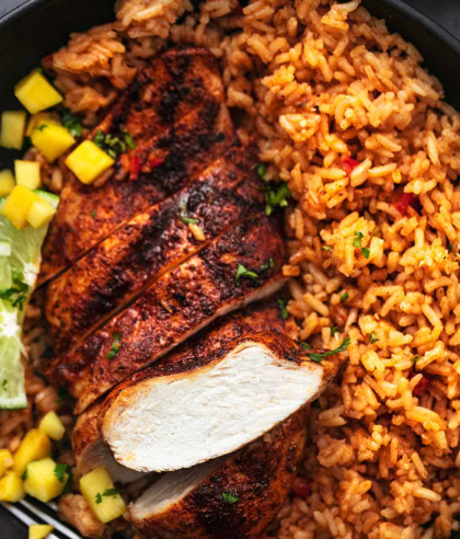 Blackened chicken over "dirty" rice with side of remoulade & mango salsa (Gluten-free)